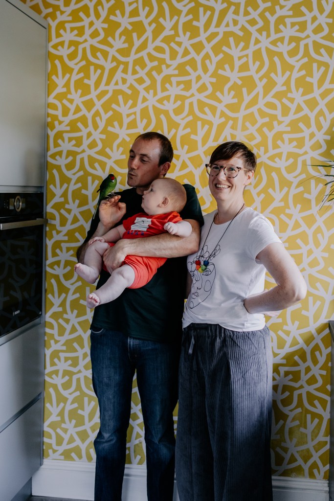 Family photo in the kitchen (including Maya the kakariki of course)